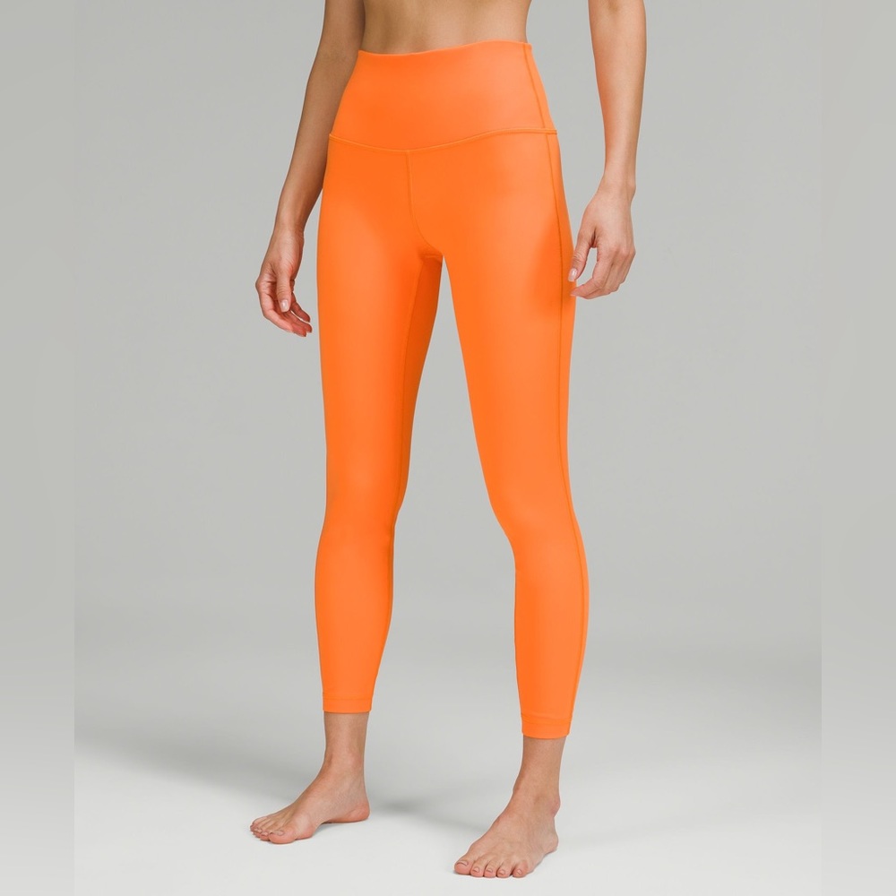 🧡Worn only Once! Wunder Under HR Tight 25" 
Color: orange soda 
Size: 8
